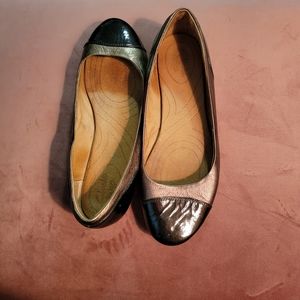 Clark's brown flats. Round toe, gently worn.